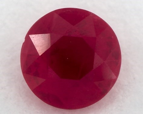 0.84 carat Round Natural Ruby Bypass Engagement Ring