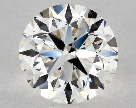 This 0.9 carat round diamond H color VVS1 clarity has Very Good proportions and a diamond grading report from GIA