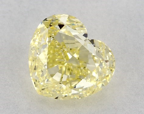This heart shaped 1 carat Fancy Yellow color VVS1 clarity has a diamond grading report from GIA