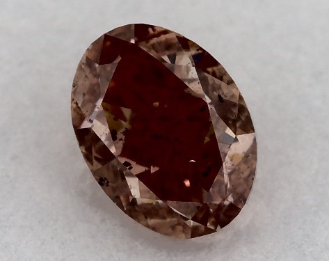  0.50 Carat Orange I1  oval diamond