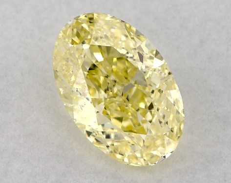  0.52 Carat Yellow I1  oval diamond
