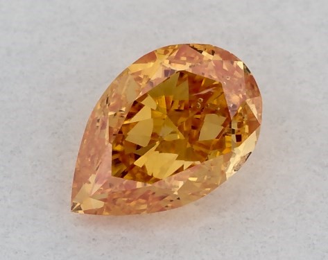  0.21 Carat Orange I1  pear diamond