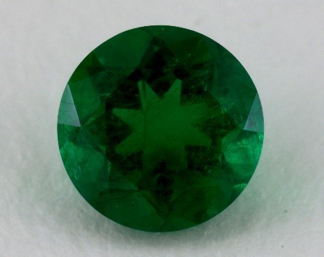 This 1.28 Round Green Emerald is sold exclusively by James Allen 