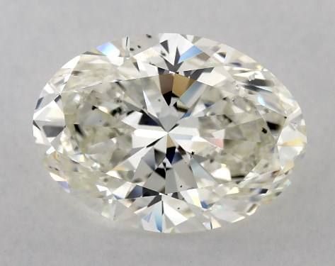 This 4.09 carat oval diamond J color SI1 clarity has Very Good proportions and a diamond grading report from GIA
