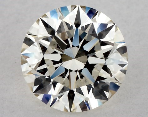 This 0.9 carat round diamond K color VS1 clarity has Excellent proportions and a diamond grading report from IGI