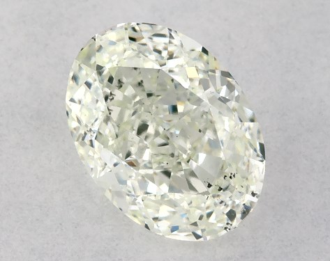 This oval cut 1 carat Light Yellow Green color SI2 clarity has a diamond grading report from GIA