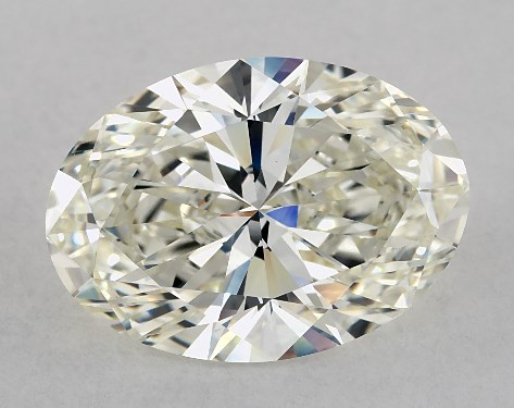 This 4.21 carat oval diamond J color VS1 clarity has Ideal proportions and a diamond grading report from IGI