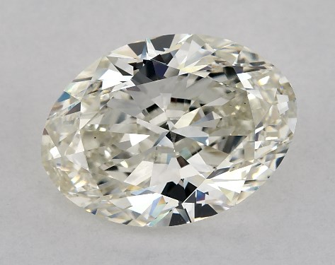 This 3.01 carat oval diamond J color VS1 clarity has Ideal proportions and a diamond grading report from IGI