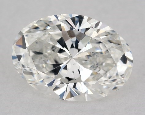This 0.74 carat oval diamond F color VS2 clarity has Very Good proportions and a diamond grading report from GIA