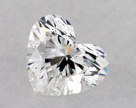 This Lab-Grown diamond 1.1 carat heart E color VS2 clarity has Ideal proportions and a diamond grading report from IGI