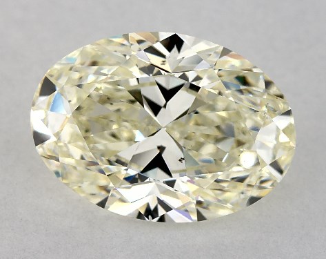 This 3.01 carat oval diamond J color VS2 clarity has Very Good proportions and a diamond grading report from IGI