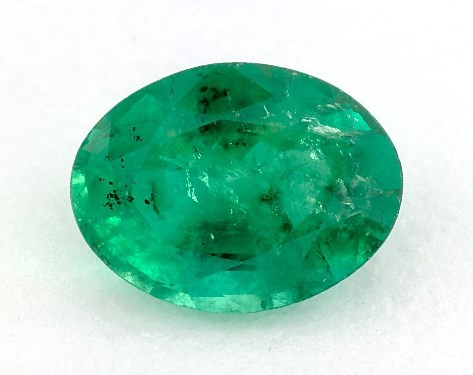 1.66 carat Oval Natural Green Emerald Tapered Baguette Diamond Engagement Ring